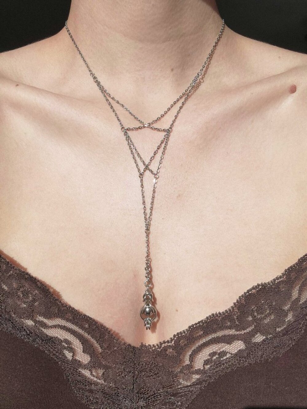 Gothic silver lace up necklacewith a long drop